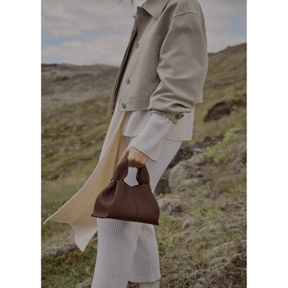 Vega – Bolso de mano minimalista