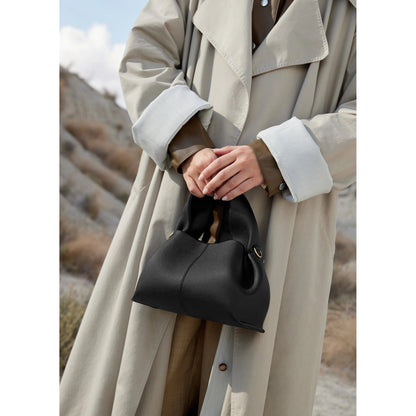 Vega – Bolso de mano minimalista